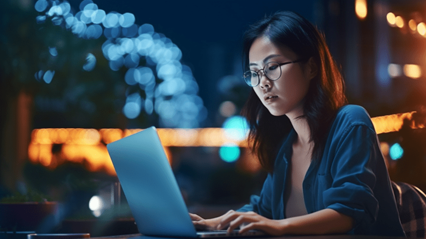 a woman working on her laptop