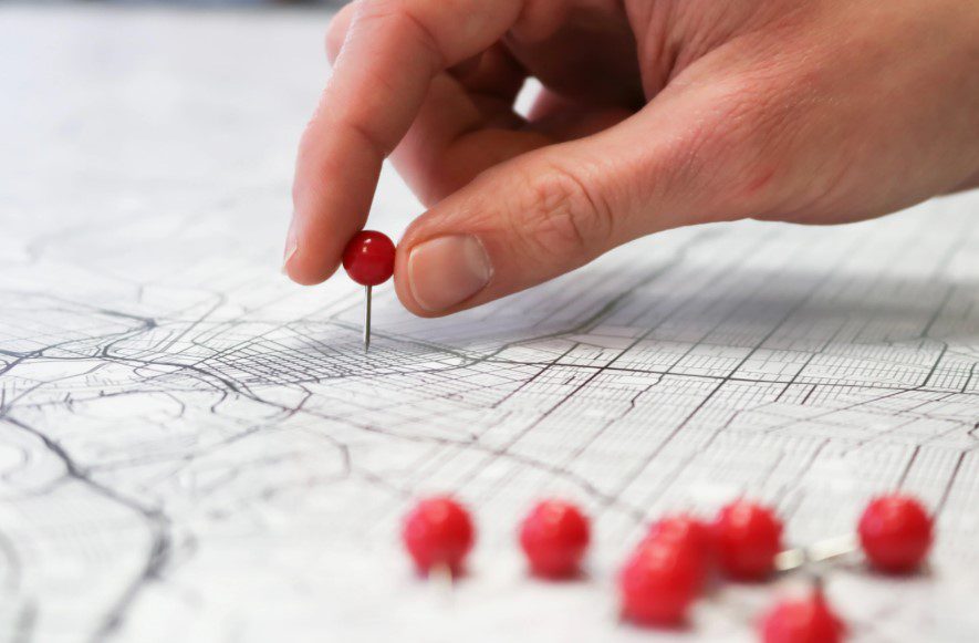 red pins on a map