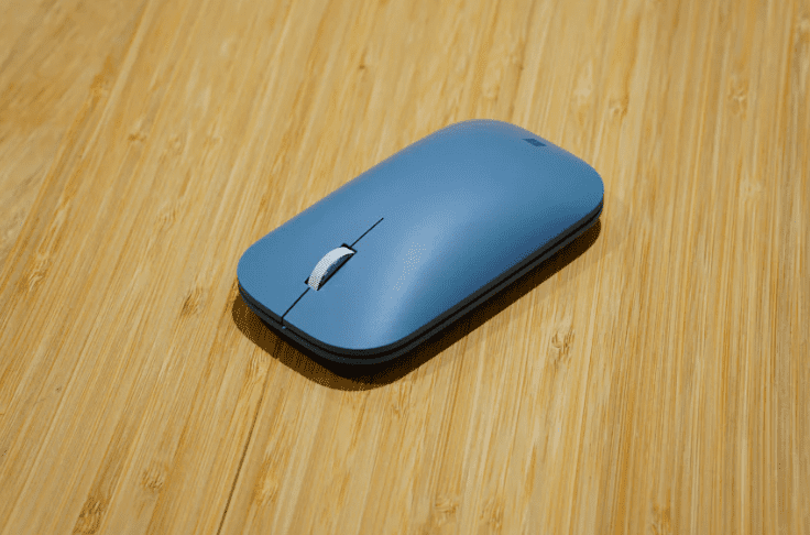 a blue mouse on a table