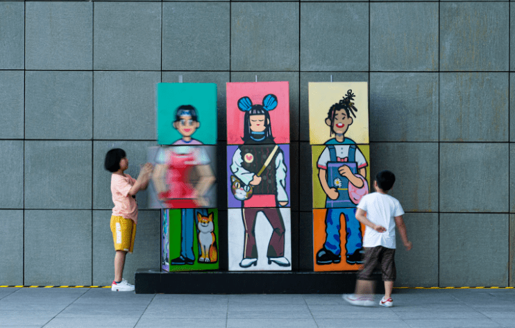 kids playing on a wall
