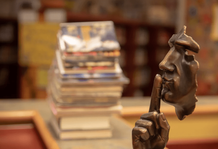 a sculpture in a library