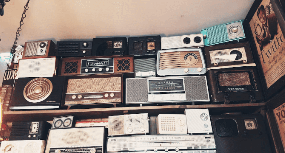old radios on a shelf